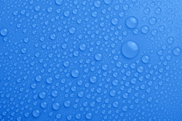 Water drops on blue background
