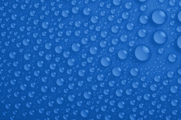 Water drops on blue background