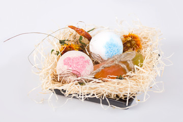 Bath balls and soap on a white background