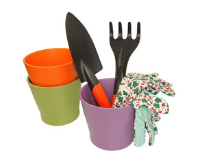 outils de  jardinage et gants dans un pot