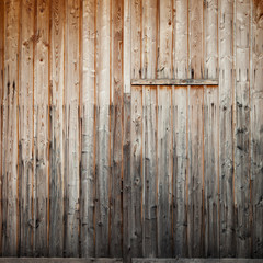 wooden door in blank wall