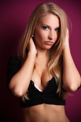 Glamor  blond woman with violet background