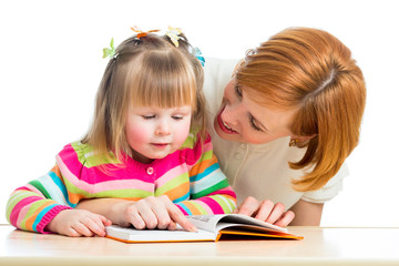 happy mother and child reading a book together