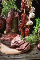 Fresh piece of ham in a smokehouse