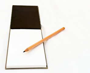 A pencil and notebook