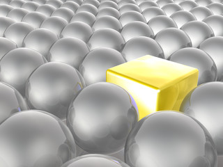 Obraz premium Yellow cube and grey spheres