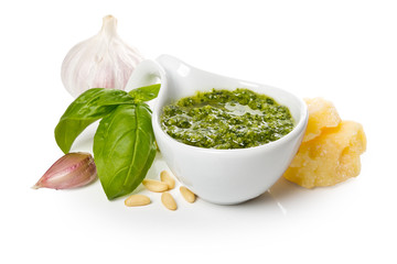 Pesto Genovese in a gravy boat and ingredients