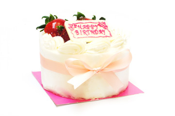 Birthday cream cake with strawberry on top