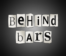 Behind bars.