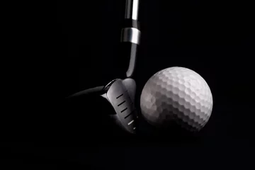 Selbstklebende Fototapeten golf  club  with ball on black background © zorandim75