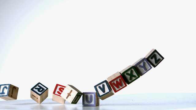 Some alphabet blocks dropping down