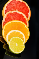 Foto op Plexiglas Plakjes fruit Sinaasappelschijfjes
