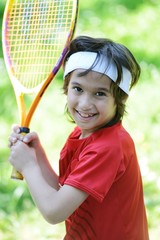 Kid playing tennis