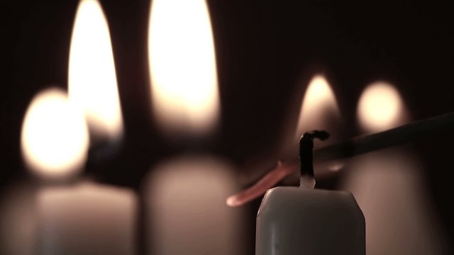 Candles being lit