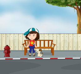 Ein Mädchen und ein Hund sitzen am Straßenrand