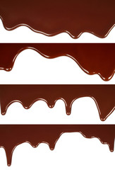 Melted chocolate dripping set on white background .