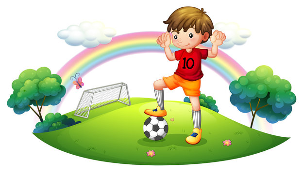 A boy in a soccer field