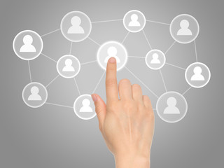 Hand pressing virtual social media icon .