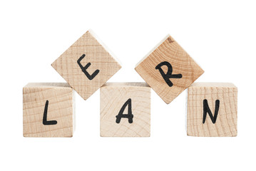 Learn Written With Wooden Blocks.