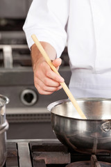 Male Chef preparing Food