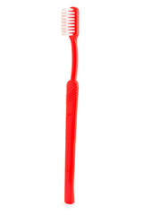 Single red toothbrush on white