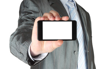 Businessman holding blank smart phone on white background.