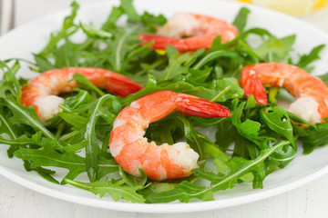 salad with seafood on the white plate