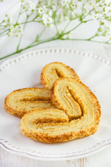 cookies on the plate with cup