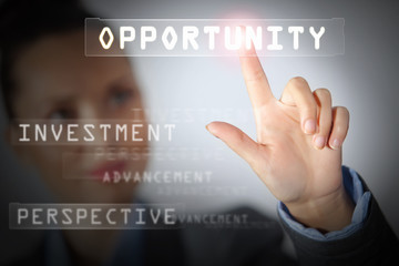 Business woman touching display