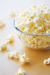 Glass bowl full of popcorn