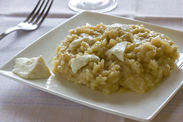 Risotto with shallots and soft cheese
