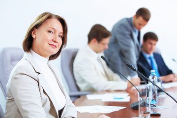 Four businesspeople at meeting