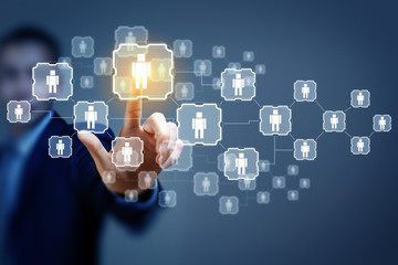 Image of male touching icon of social network