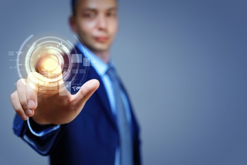 Business man touching display