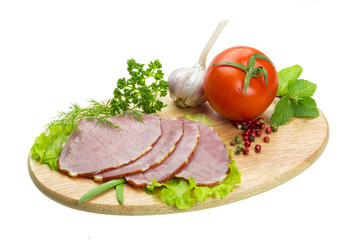 Ripe fresh ham with vegetables