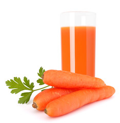 Carrot juice glass and carrot tubers
