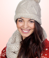 Attractive girl with with wool hat and scarf