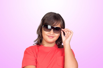 Naklejka premium Adorable preteen girl with sunglasses