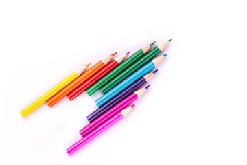 Fototapeta premium Colour pencils forming an arrow
