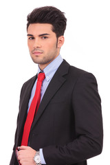 holding glasses and looking at you