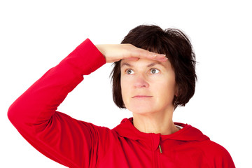 Woman holds open hand to his forehead and looks