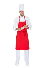 Portrait of cheerful chef in uniform