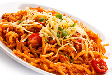 Pasta with meat, tomato sauce, parmesan and vegetables