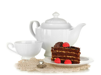 Teapot, cup of tea and delicious cake isolated on white