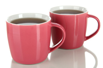 Cups of tea isolated on white