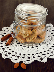 Aromatic cookies cantuccini on bank on wooden table close-up
