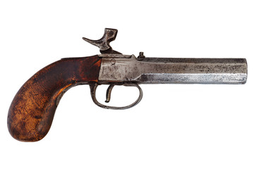 Nineteenth century handgun isolated on white