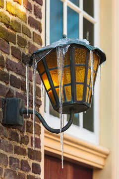 Antique Dutch lantern covered with icicles