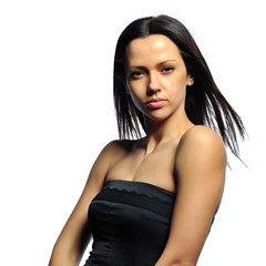 Naklejka premium Close-up portrait of beautiful young woman, isolated over white