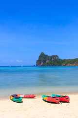 Kayaks on a beach in Thailand